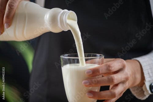 Goodness of kefir, a fermented dairy superfood drink, brimming with natural probiotics Lacto and Bifido Bacterium. photo