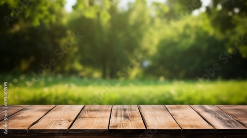 Empty wooden table on a background of green grass real photo © Tran