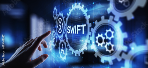 SWIFT international payment system financial technology banking and money transfer concept on virtual screen. photo