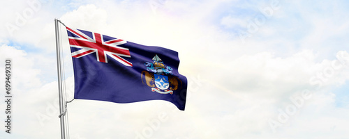 Tristan da Cunha flag waving on sky background. 3D Rendering