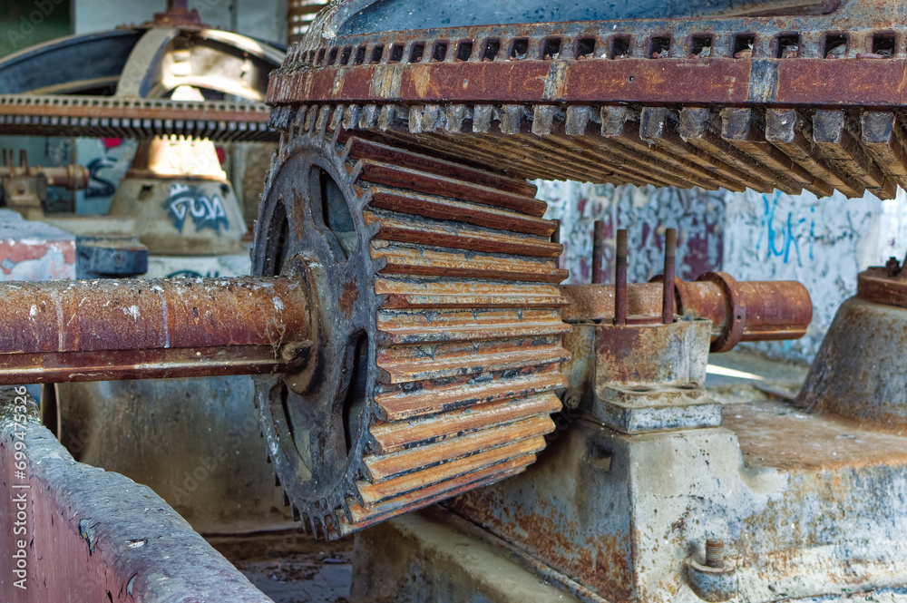 Metal parts of old and abandoned hydro power plant facilities.