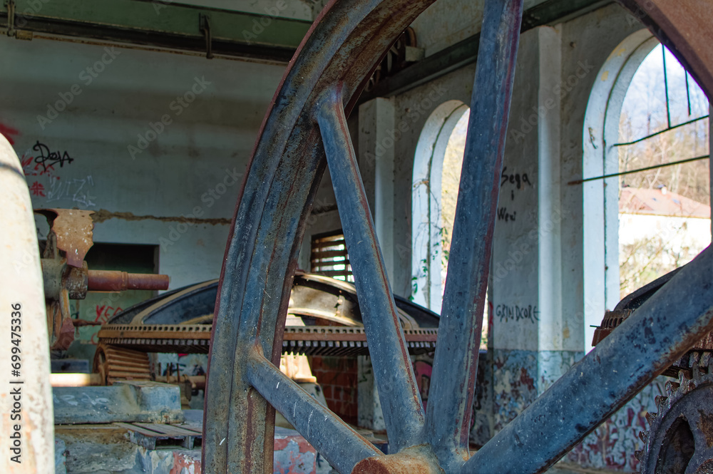 Metal parts of old and abandoned hydro power plant facilities.