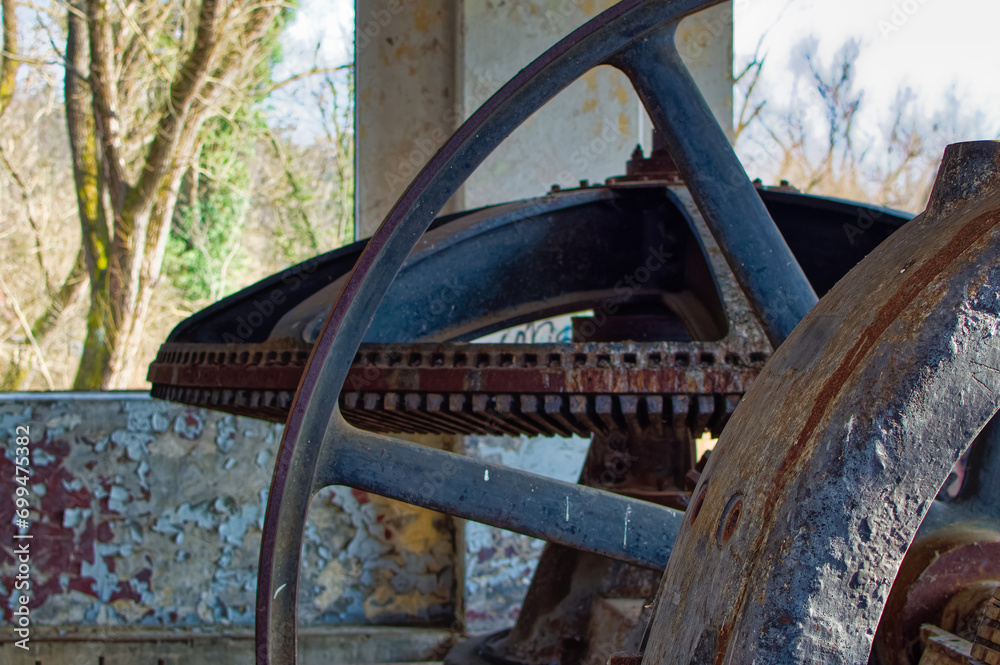 Metal parts of old and abandoned hydro power plant facilities.