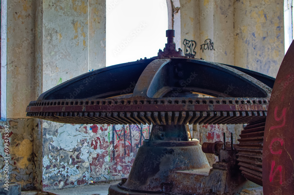 Metal parts of old and abandoned hydro power plant facilities.