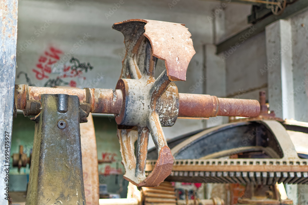 Metal parts of old and abandoned hydro power plant facilities.