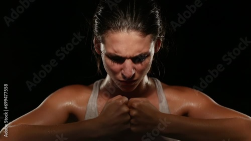 Intense Female Fighter Yelling with Ferocity and Focus During Training, Motivated, Screaming with Passion and Strength