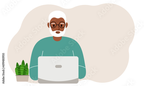 A man is working or studying at a laptop. Freelancing or distance learning and work concept.