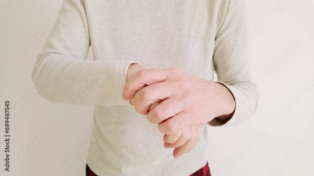 Person with hand and finger pain.
Person with hand and finger pain.