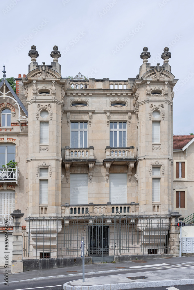 Nancy, France - May 13th 2020 : Focus on a building built at the beginning of the 19th century with numerous sculptures and decorations on its facade.