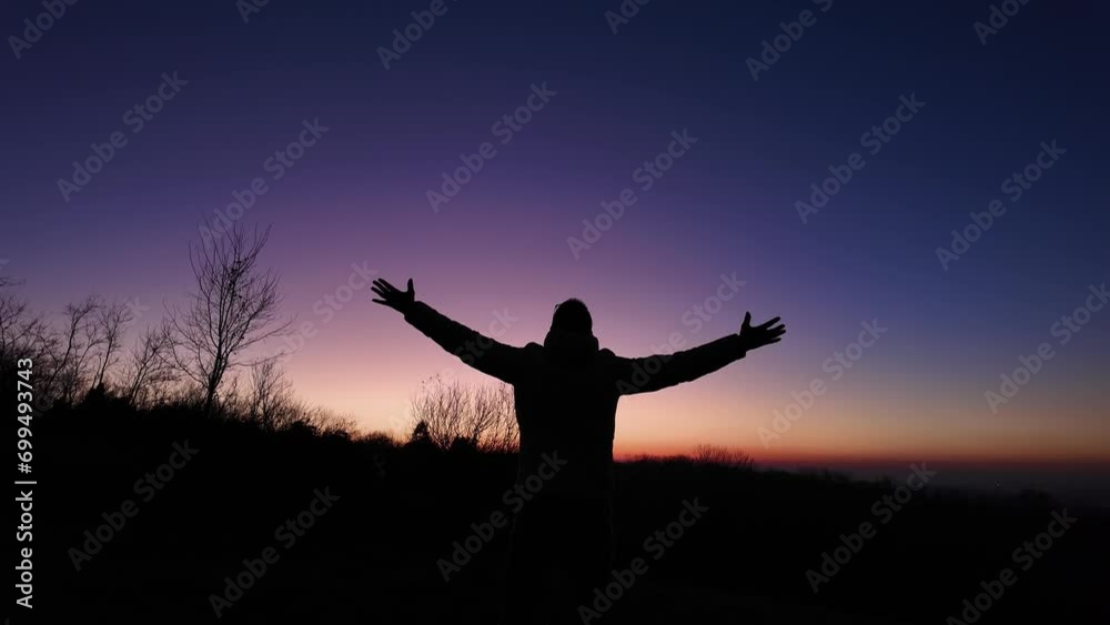 Man with arms wide open enjoying outdoors under stars, planets and Moon. Man with arms wide open enjoying outdoors under stars, planets and Moon.