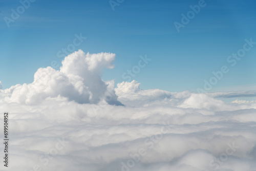 Fototapeta Naklejka Na Ścianę i Meble -  Looking at the clouds and sky on the plane