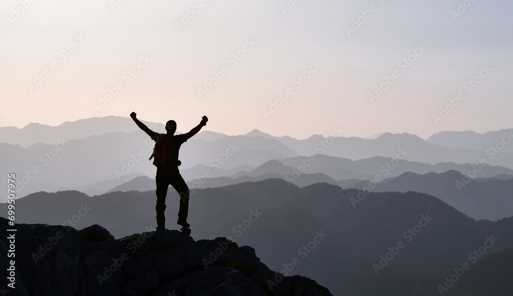 Young Mountaineer Watches an Amazing View Young Mountaineer Watches an Amazing View