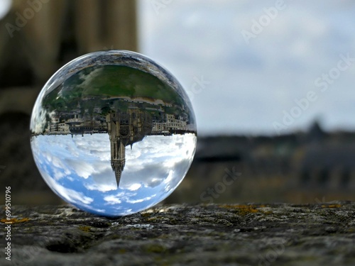 Caen, August 2023 - Visit the magnificent city of Caen, capital of Normandy. View of the city through a lens ball