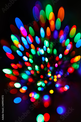 A magical display of festive bokeh lights on a black background