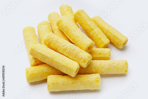 Roller corn snack on white background