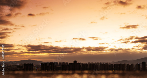 Background of city buildings at sunset