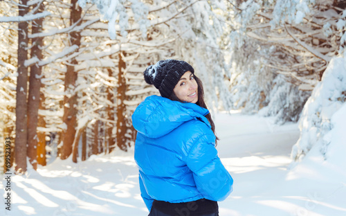 Beautiful woman with warm blue jacket standing in the winter mountain .Vitosha ,Bulgaria 