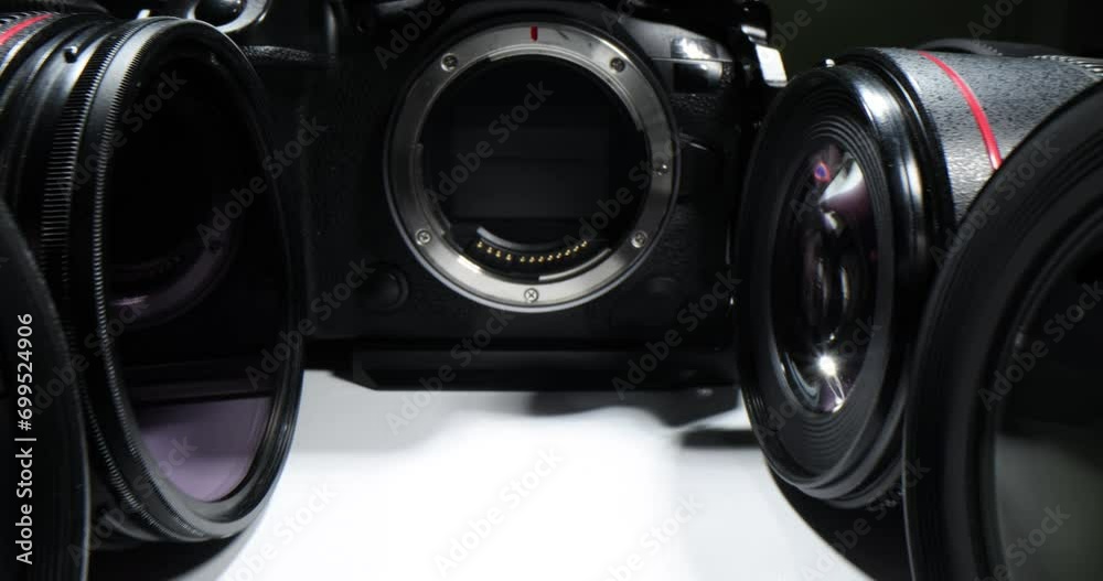 Professional black camera and lenses for it closeup 4k movie slow motion