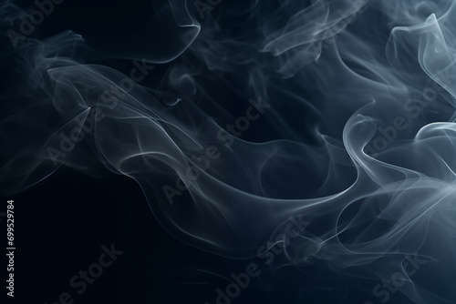 Beautiful smoke patterns are floating on a dark background.