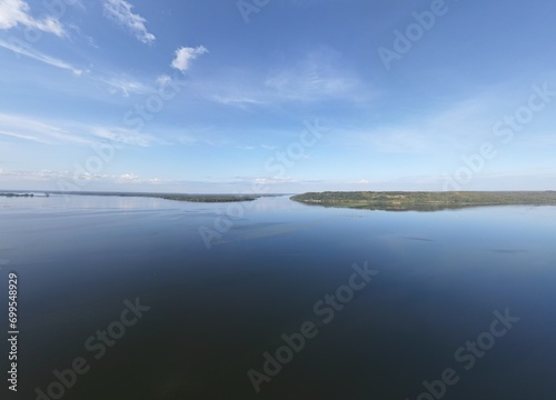 Wallpaper Mural Landscapes of America, on the horizon a strip of land separates the sky and the lake. Torontodigital.ca