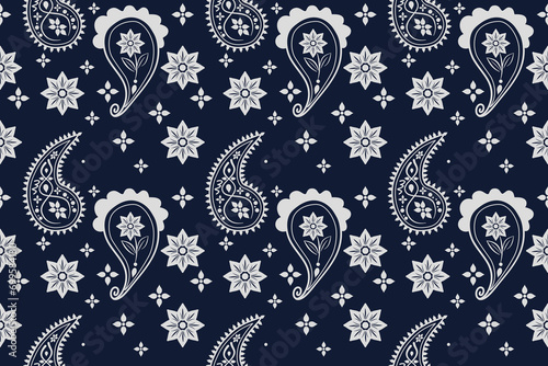 paisley ethnic embroidery on Black background.Ikat oriental seamless pattern traditional.Aztec style vector illustration.design for texture fabric