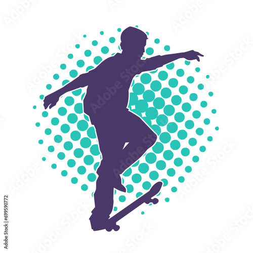 Silhouette of a teenager boy playing skateboard. Silhouette of a male in action pose on skateboard.