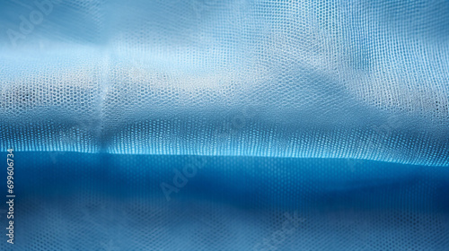 Close-up of Blue Spunbond Texture Background in Healthcare Setting - Sterile Medical Fabric for Surgical and Wound Treatment Concepts.