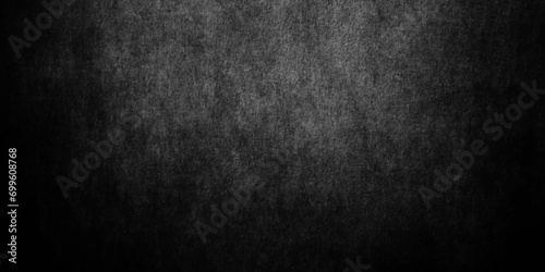 Abstract design with textured black stone wall background. Modern and geometric design with grunge texture Dark black grunge textured concrete backdrop background. Grunge texture .