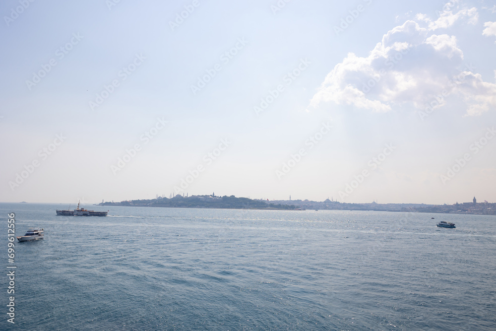 Ferries and ships on the bosphorus and cityscape of Istanbul