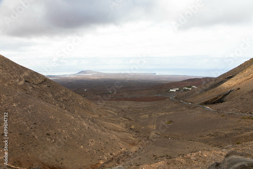 Spectacular view of the volcanic landscape in Timanfaya National Park. Lanzarote, Canary Islands, Spain, Atlantic, Europe. Tourism and vacations concept.