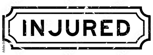 Grunge black injured word rubber seal stamp on white background