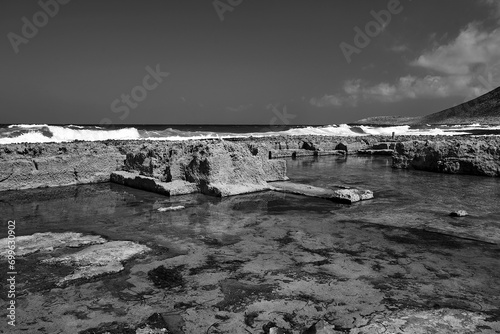 Abandoned quarries on the sea coast in the town of Stavros on the island of Crete