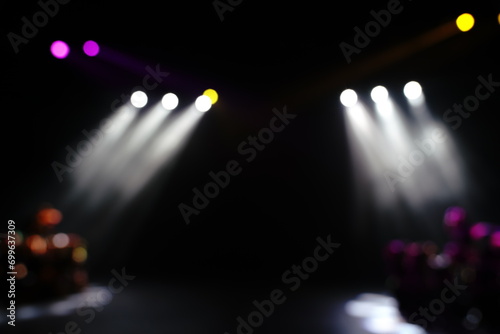 Defocused entertainment concert lighting on stage, blurred disco party and Concert Live. © Leo Li