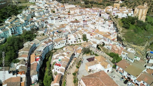 Aerial view of Setenil de las Bodegas, Andalusia. It is famous for its dwellings built into rock overhangs above the river photo