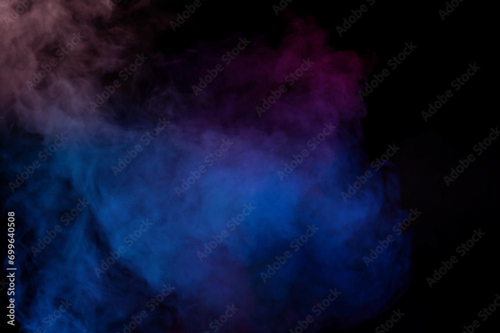 Blue and purple steam on a black background. Blue and purple steam on a black background.