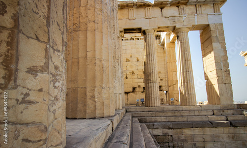 Nike Propylaea, the entrance of the ancient Acropolis of Athens Ruins. View of the Propylaea Entrance Gateway Ruins at the Acropolis.  photo