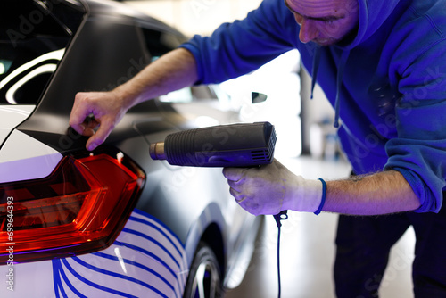 Car tinting, color change, detailing, protective film