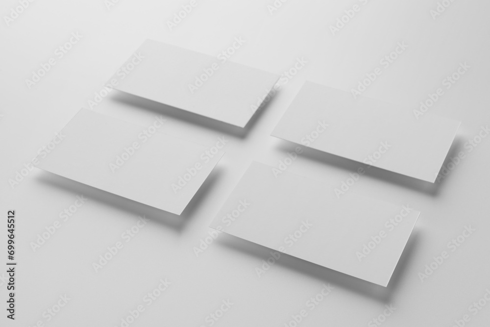Blank business cards on white background. Mockup for design Blank business cards on white background. Mockup for design