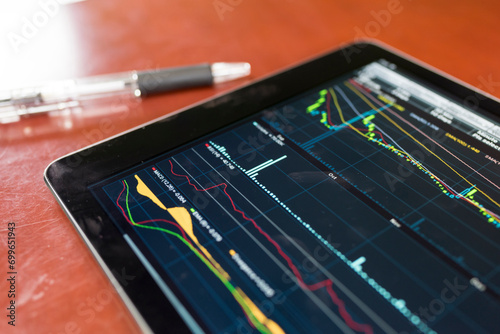 Stock graph with tablet photo