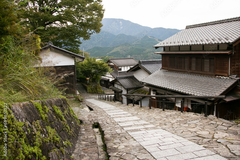 Streets and traditional Japanese houses at Magome Juku town along the Nakasendo trail in Kiso Valley, Japan.
