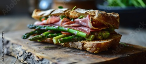 Asparagus and luncheon meat on a hot sandwich. photo