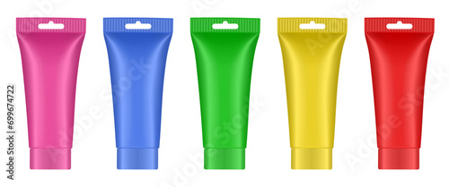 Purple, blue, green, yellow and red tubes with hanging holes. Rainbow palette of acrylic paint in plastic tubes. Liquid watercolor. Oil paint or gouache. Tempera. Hand cream, mask or lotion.
