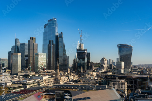 London, UK - 25 November 2023: City of London skyline as viewed from St Pauls Cathedral. Including new buildings under construction and the famous The Walkie-Talkie skyscraper photo