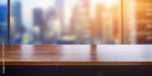 An empty desk with a bokeh background in an office environment in an office building