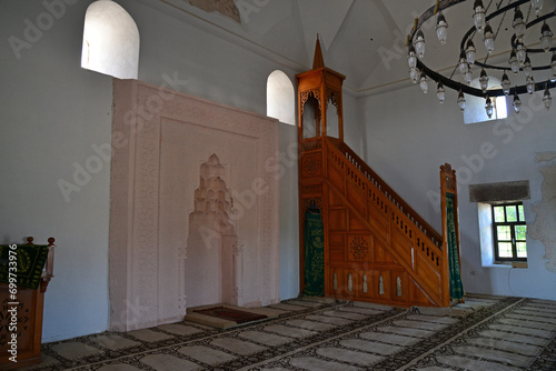 Assos Hudavendigar Mosque, located in Canakkale, Turkey, was built in the 14th century. photo