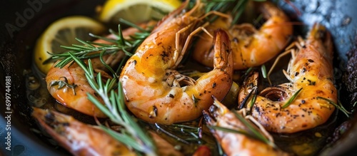 Prawns cooked with rosemary and lemon