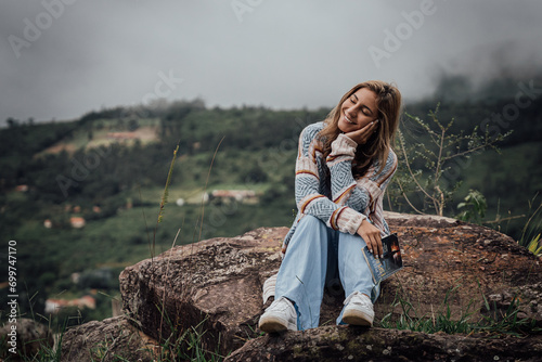 Teenager/woman on a hill