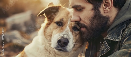 Man displeased with odor from canine.