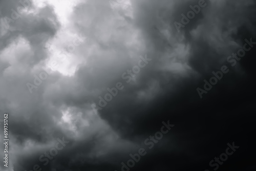 Dramatic sky with grey clouds. Thunderstorm before rain. Black clouds. Nature abstraction. Dark stormy background. Windy weather. High quality photo