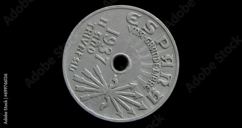 Obverse of Spain coin 25 centimos 1937, isolated in black background. 3d animation in 4k video. photo